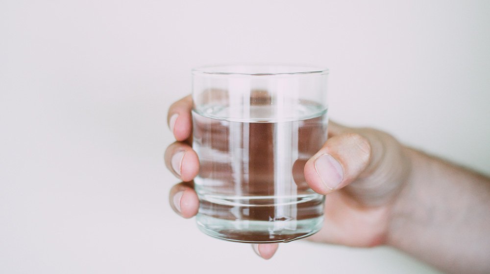 Your Qs: Does drinking water with meals impact digestion?